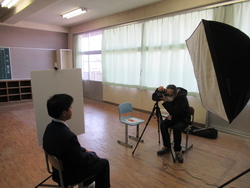 カメラマンに写真撮影をしていただている写真